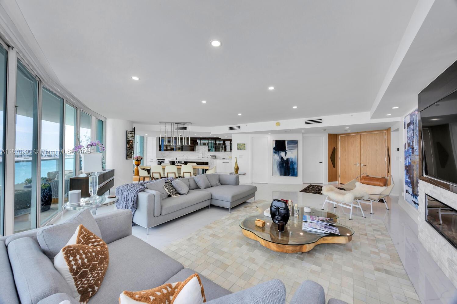 Experience unparalleled waterfront living at Bristol Tower. This impeccably renovated high-rise condo offers 2,600
sqft of refined space, featuring 3 spacious bedrooms & 3 modern bathrooms. Floor-to-ceiling windows frame
breathtaking views of Biscayne Bay & the Key Biscayne Bridge, filling the home with natural light & unobstructed
views.The open-concept kitchen is outfitted with top-tier Miele appliances, while sleek 30x30 porcelain flooring
flows seamlessly throughout.The primary suite is a private retreat with 2 walk-in closets, dual vanities, a large
shower & a freestanding tub perfectly positioned to capture stunning water views. Additional features: 2 deeded
parking spaces, a storage unit, 24-hr concierge, gym, spa, tennis court, BBQ area, valet service & serene garden terrace