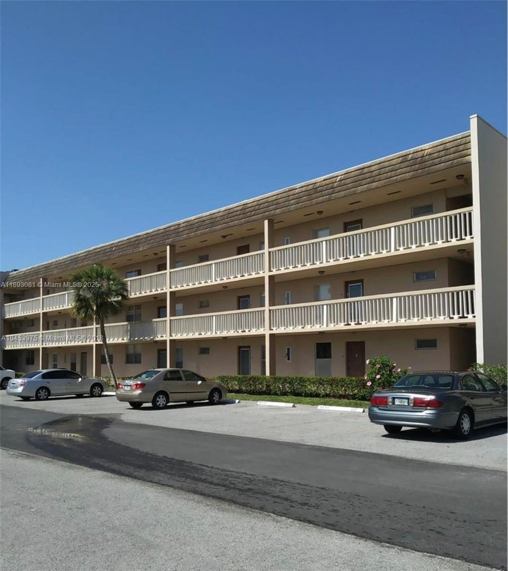 Photo of 6150 NW 62nd St #308, Tamarac, FL 33319 (MLS # A11893081)