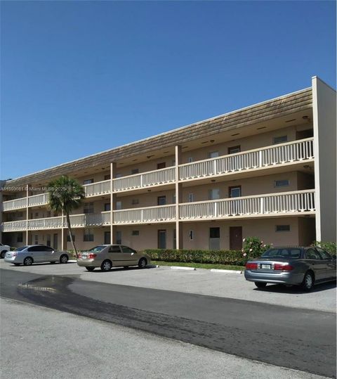 Photo of 6150 NW 62nd St #308, Tamarac, FL 33319 (MLS # A11893081)