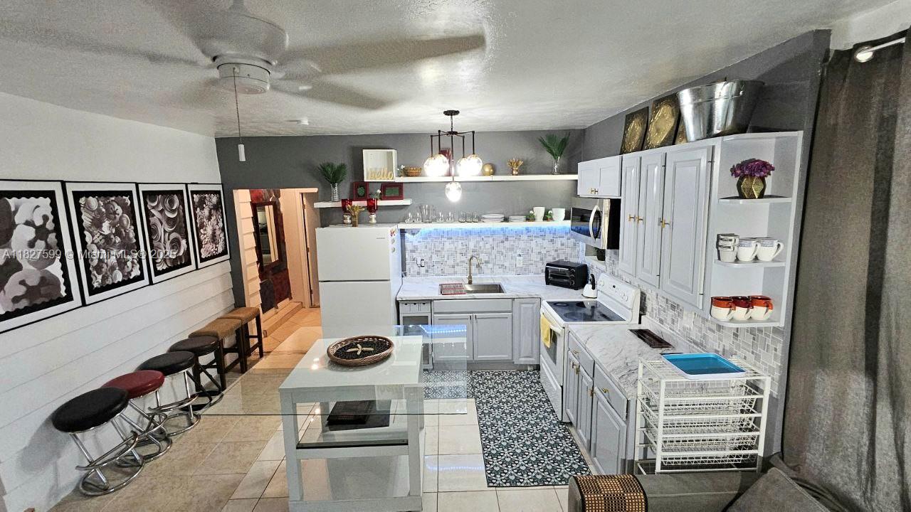 FURNISHED AND/OR UNFURNISHED FOR SHORT OR LONG TERM RENTAL.
Location, location! Short-term rental available, price subject to terms. Comfortably sized rooms surrounded by front yard and fully fenced for maximum privacy?this is truly your oasis in the city.
Conveniently located between US1 and Miami International Airport, just 1/2 mile from the University of Miami and minutes from Coral Gables, Coconut Grove, Dadeland Mall, Whole Foods, Milam's, Publix, and Winn-Dixie.
Also just half a mile from Doctors Hospital, South Miami Hospital, and Coral Gables Hospital. Only 20 minutes from Biscayne beaches and with easy access to the Palmetto Expressway and US1.