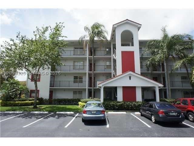 Photo of 1000 SW 128th Ter #303V, Pembroke Pines, FL 33027 (MLS # A12094325)