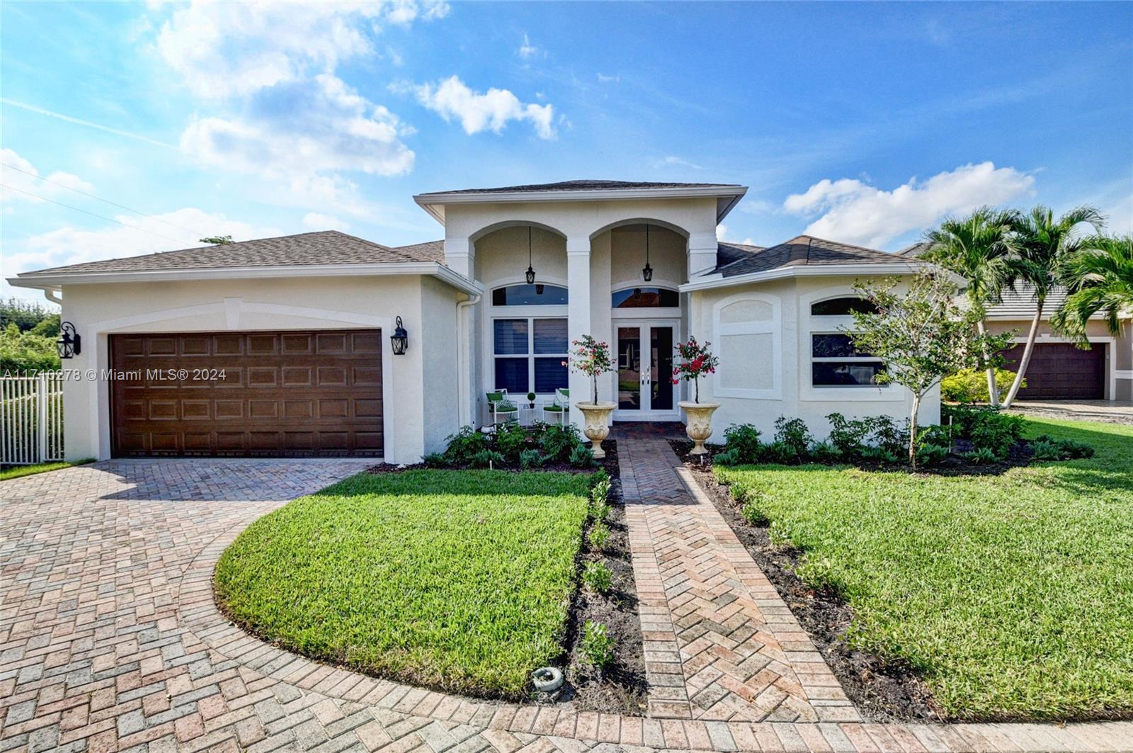 Rarely available 4 bed/3bath home with pool in gated Hills at Lake Eden, a small community of 56 homes and one of the only gated communities east of I-95 - and just a 5-minute drive to famous and vibrant Atlantic Avenue and Delray's local pristine beaches. The double door entry takes you into a completely updated home with a 2019 roof with a modern open floor plan. This spacious home has been meticulously renovated by the original owners with top-of-the-line finishes and many custom enhancements making this the home the perfect place for entertaining. 4 Bedrooms and 3 full bathrooms with one of the bathrooms functioning as a Cabana bathroom. New roof in 2019, Pool resurfaced in 2018. New A/C 2023.