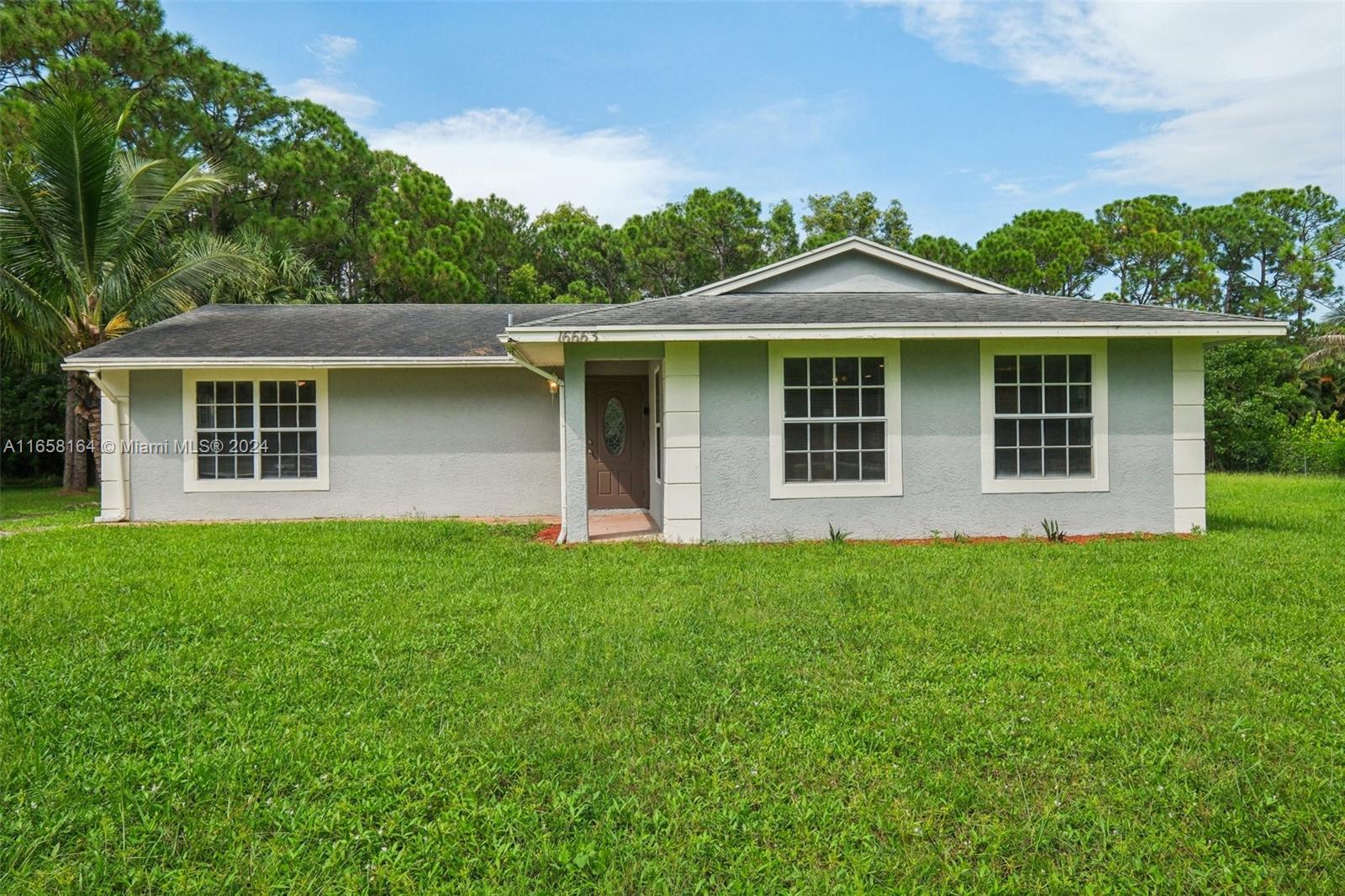 16663 N 92nd Ln N Ln, Loxahatchee, Palm Beach County, Florida - 4 Bedrooms  
2 Bathrooms - 