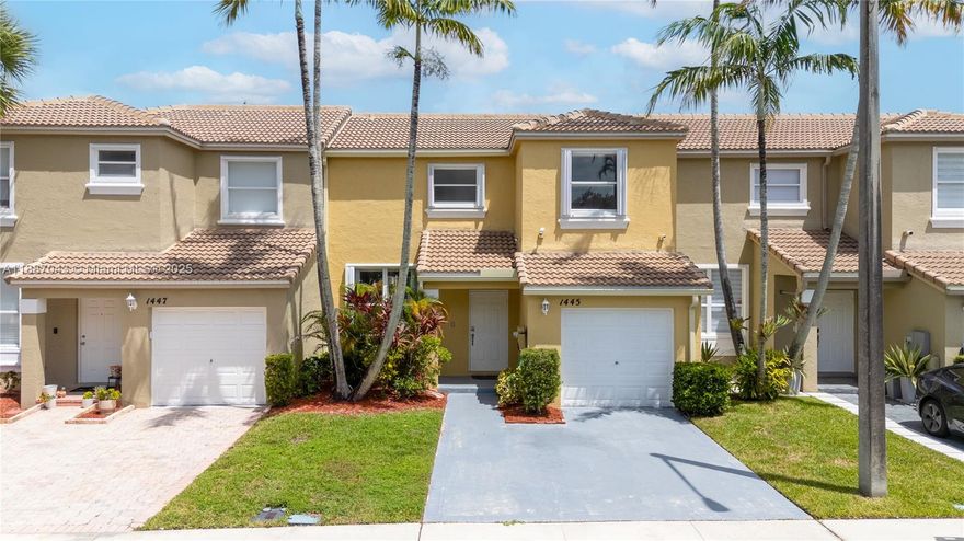 Ideally situated in the heart of Pembroke Pines, this 3-bedroom, 2.5-bath home has a BRAND NEW ROOF, and offers a spacious open-concept kitchen with granite countertops, bar seating, wood cabinetry, and a full stainless steel appliance package. Newly painted interior featuring tile and laminate wood flooring, updated bathroom vanities, and built-in closets.  Air-cooled garage —ideal for a playroom, home office, or additional storage. Enjoy a private, fenced patio and ample parking.Towngate offers a clubhouse, pool with kiddie area, playground, tennis and basketball courts, soccer/baseball fields, fitness center, banquet hall, and is near top schools and shopping plazas.