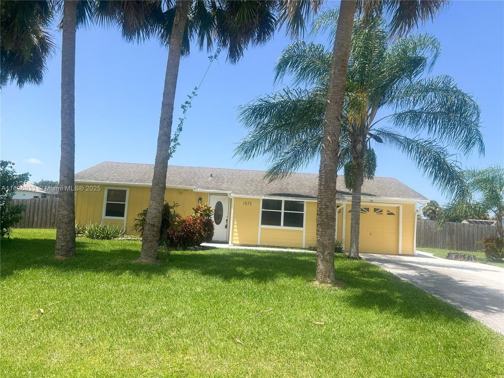 Photo of 1573 SW Lexington Dr, Port St Lucie, FL 34953 (MLS # A11826933)