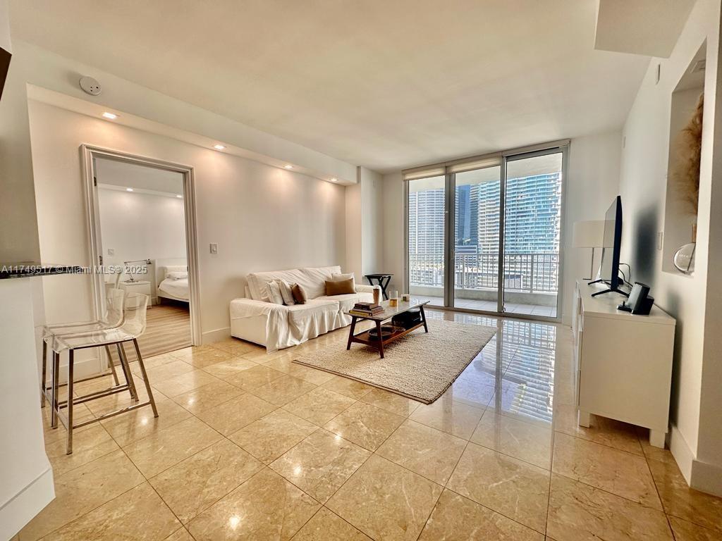 Turnkey opportunity. Island living at its best! Immaculate and tastefully furnished 3/3 unit in private Brickell Key. Features new floors and modern lighting. 2 assigned parking spaces next to the building entrance. Full Service Concierge, Complimentary Valet, WIFI, great pool and jacuzzi, top of the line gym, party room and more. Nice river and city views. A must see!