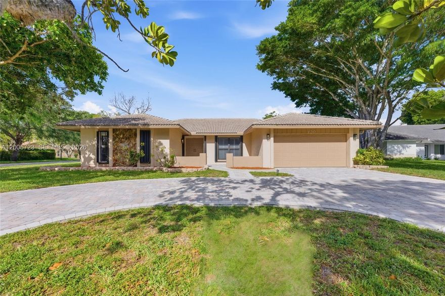 Welcome To This Beautiful 4 Bed /2 Bath Pool Home Located On An Oversized Corner Lot (Over 15,000 Sq Ft) With Water Views In Shadow Wood; Coral Springs! Perfectly Situated On A Private Cul-De-Sac. This Home Features A Spacious 2-Car Garage W/ 4 Additional Parking Spaces And A Circular Paver Driveway.  Featuring A Welcoming Layout With Abundant Natural Light, Plantation Shutters, Tile & Laminate Flooring. Spacious Eat-in Kitchen With SS Appliances, And Plenty Of Storage. Enjoy A Seamless Layout As The Kitchen And Family Room Provide Direct Views Of The Pool And Covered Lanai, Making It Ideal For Year-round Entertaining. Primary Suite Offers A Walk-in Closet & Private Access To The Pool & Deck. The Ensuite Bathroom Is Upgraded W/ Travertine Marble, A Granite Vanity, & A Walk-in Shower. Secondary Bedrooms Have Closets And Ceiling Fans. They Share A Renovated Bathroom That Has Dual Sink Vanity, Sleek Quartz Countertop, & Frameless Glass Enclosure Shower W/ Premium Fixtures. Spacious Pool Featuring A Secure, Fenced Backyard Ideal For Pets And Gatherings. Upgrades Include A Hurricane-impact Garage Door And Full Storm Accordions And Panel Shutters Offering Full Insurance Discounts. Newer Ac And New Water Heater. Enjoy The Peace Of A Quiet Street With The Convenience Of Being Centrally Located Near Top-rated Schools, Dining, And Parks. No Hoa!