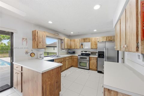 Tiny photo for 120 NW 84th Way, Coral Springs, FL 33071 (MLS # A12005723)