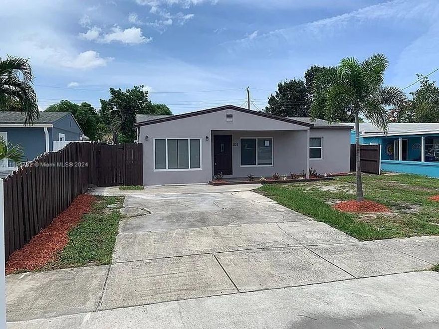 Beautifully redone 4 bedroom, 2 bath house with $80k hurricane impact windows, oversized master bedroom with huge walk-in closet and large shower., newer roof and AC, new tankless water heater, new sod, mulch and plants. This home has many features including large 42 inch Shaker White Kitchen Cabinetry, beautiful modern quartz countertops, brand new Stainless Steel appliances with 12 month warranty, waterproof vinyl flooring throughout, modern bathroom design, and beautiful sliding barn doors. All on a quiet street in nice neighborhood with large, private backyard.