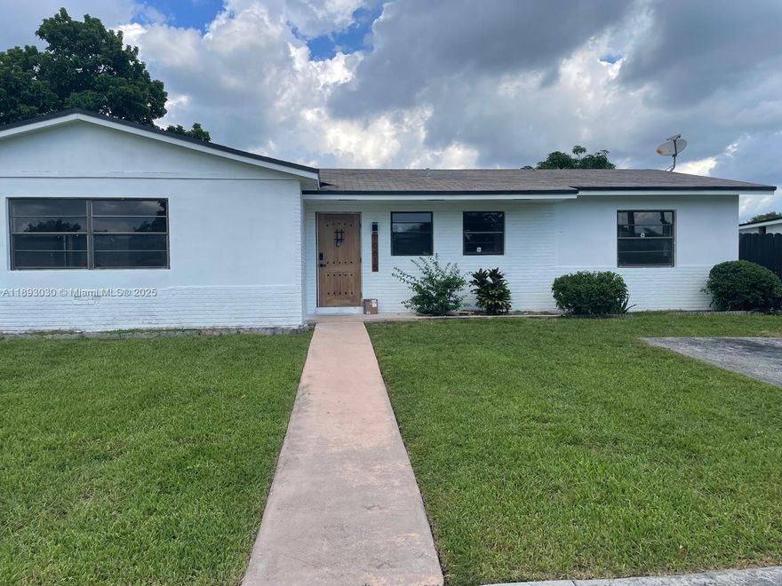 Discover luxury living in this fully renovated 4-bed, 2-bath home on over 1/4 acre in a prime Miami location. High-end finishes shine, from sleek quartz countertops and gold fixtures in the kitchen to elegant porcelain 'wood look' flooring. The secured fenced backyard is a tropical oasis, featuring mango, avocado, papaya, and more. Ideally situated near major highways, offering easy access to the airport and surrounding areas. Enjoy nearby amenities without HOA restrictions, perfect for boat/RV parking. Secure this outstanding residence and enjoy the luxury it offers. Experience tropical elegance in a central, connected locale! Highlights include an open-concept living area, perfect for entertaining, and a spacious master suite with luxurious en-suite bath, ensuring both comfort and style.
