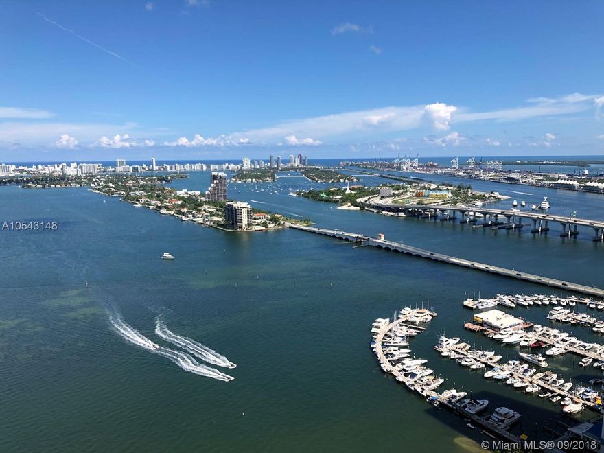 Amazing 1 bed/1.5 bath at brand new Aria on the Bay. Bright and spacious sought with breathtaking panoramic views. Unit features Italkraft cabinetry, Bosch stainless steel appliances and Brizo faucets. Floor-to-ceiling windows and large balcony great for entertaining. 5 star amenities including sunrise and sunset pool, hot tub, movie theater, state-of-the-art fitness center, yoga studio, spa, BBQ, summer kitchen, lounge and kids’ playroom, business center, outdoor fire pit, great room with flat-screen TVs and pool tables, valet parking and concierge services. Great location, in the heart of the Art and Entertainment District, close to parks, restaurants, shops and entertainment.