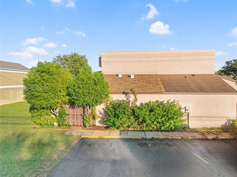 Photo of 12393 NW 12th Ct, Pembroke Pines, FL 33026 (MLS # A11921061)