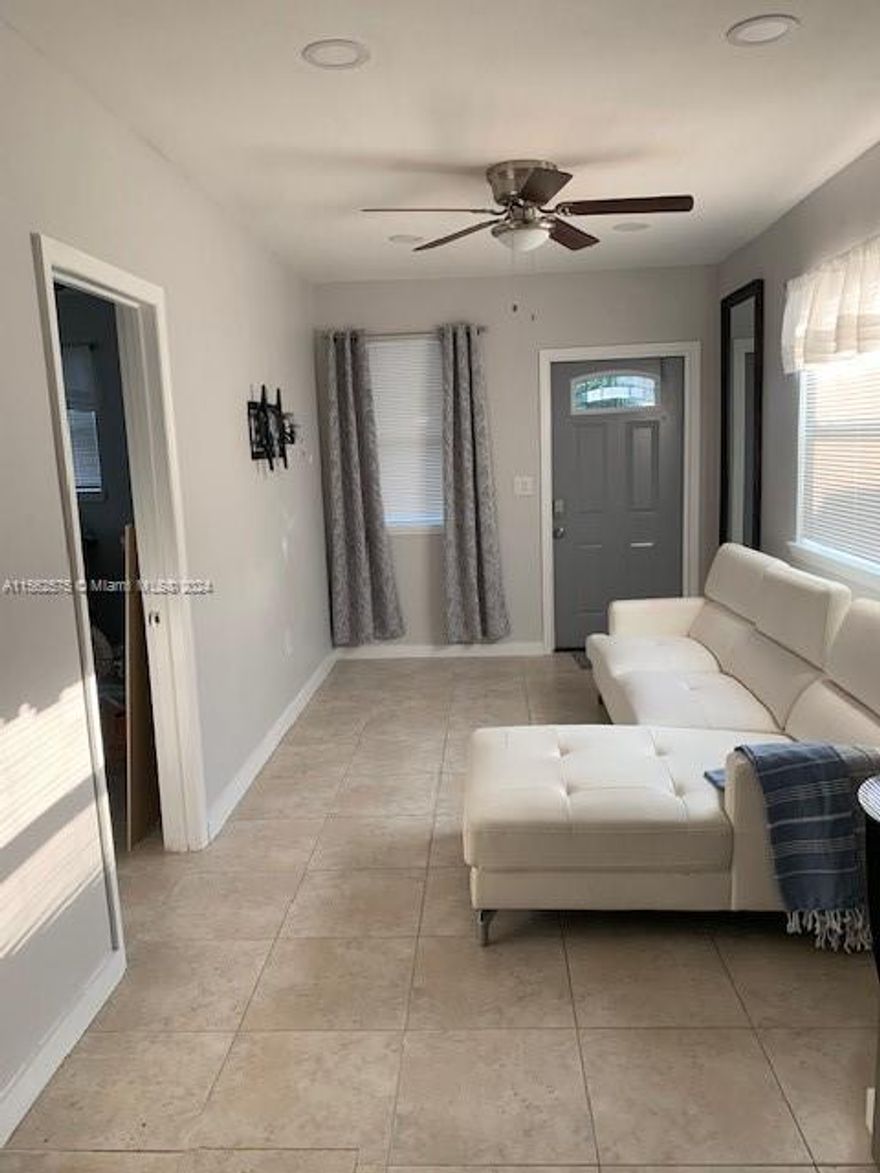 This charming starter home in North Miami Beach is tastefully decorated and perfect for first-time buyers. One
bedroom and one bathroom offer a cozy and intimate living space. The kitchen boasts stainless steel appliances,
adding a modern touch to the home. The property has recently been renovated, including a new roof, impact door,
and windows, ensuring safety and energy efficiency. The location is ideal, with easy access to shops, restaurants,
and major highways. Don't miss this opportunity to own a stylish, affordable home in a desirable neighborhood.