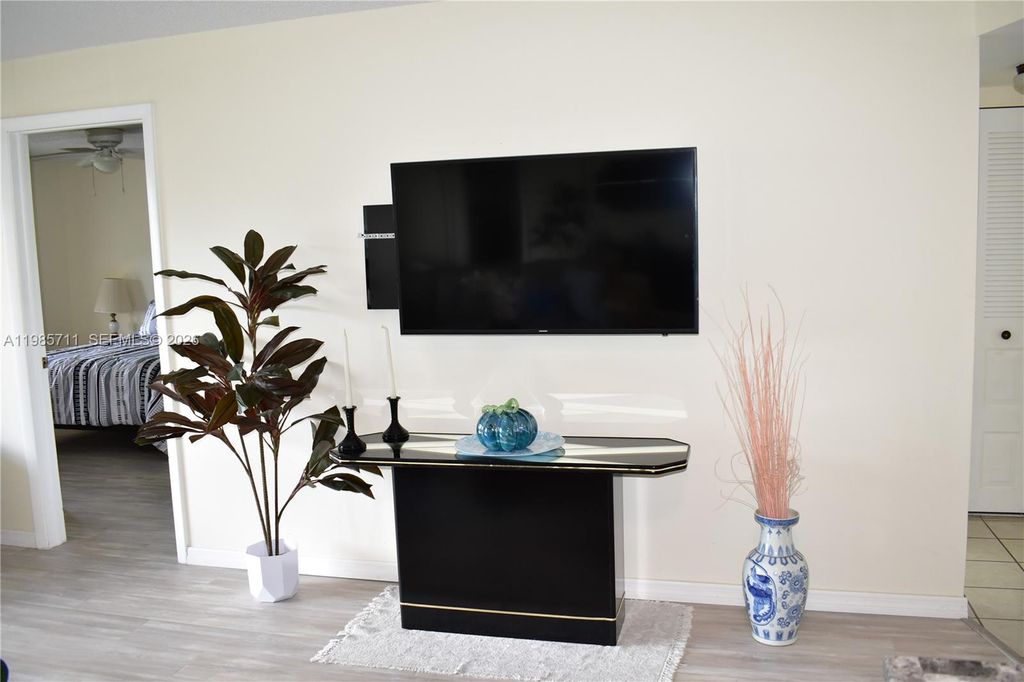 Photo of 9621 Sunrise Lakes Blvd #302, Sunrise, FL 33322 (MLS # A11985711)