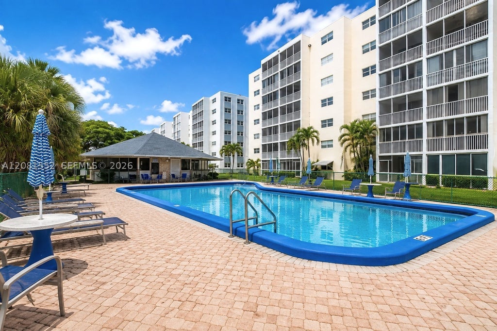 Photo of 301 NE 14th Ave #307, Hallandale Beach, FL 33009 (MLS # A12081552)
