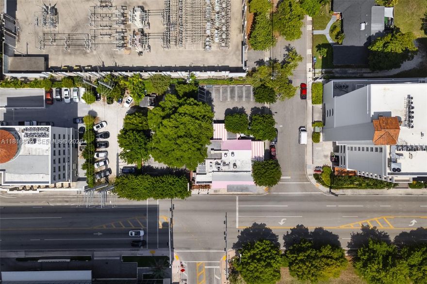 Exceptional opportunity to purchase a prime redevelopment site just steps from Coral Gables on a corner lot. Currently configured as a restaurant, the property is in excellent condition and offers flexible potential for retail, medical, office, or boutique residential use. The offering includes a 2,698 SF building, a 10,384 SF main lot, and a 5,700 SF adjacent parcel for parking. Located near Miracle Mile, Coral Gables Plaza, and the Loews Hotel, with superb walkability and close proximity to Brickell, Coconut Grove, MIA, US-1, and SR 836. Surrounded by condos, offices, and cultural amenities—this is a rare opportunity in a prime urban corridor.