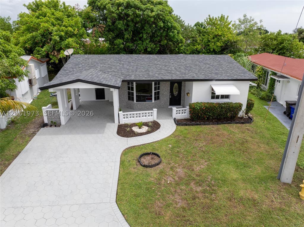 Photo of 4595 NW 43rd Ct, Lauderdale Lakes, FL 33319 (MLS # A12061973)