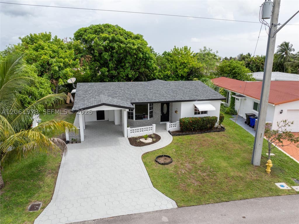 Photo of 4595 NW 43rd Ct, Lauderdale Lakes, FL 33319 (MLS # A12061973)
