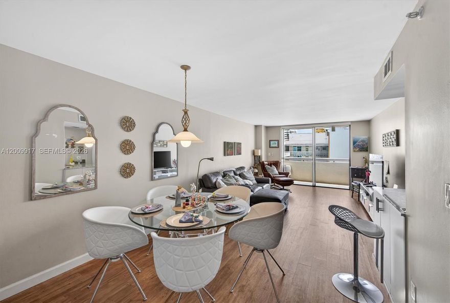 PRICED TO SELL. Updated 2-bedroom, 2-bath residence offering approximately 960 sq ft in the heart of Miami Beach. Ideally located adjacent to the Miami Beach Convention Center, just two blocks from the beach, and across from the New World Symphony and Jackie Gleason Theater. This well-maintained unit features updated flooring, kitchen, and bathrooms,  gym, a rooftop pool, bike storage, and a separate storage unit. AC Unit replaced in 2004. HOA includes water and insurance.  Enjoy an unbeatable central location near dining, shopping, entertainment, and houses of worship. Park your car and experience the best of Miami Beach living with ocean breezes at the pool, and walkable convenience.