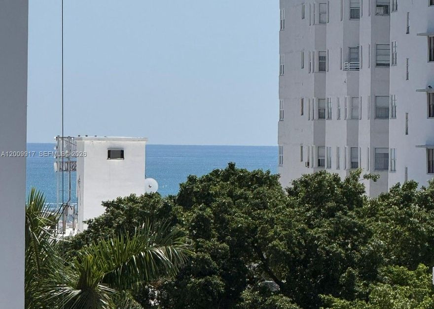 PRICED TO SELL. Updated 2-bedroom, 2-bath residence offering approximately 960 sq ft in the heart of Miami Beach. Ideally located adjacent to the Miami Beach Convention Center, just two blocks from the beach, and across from the New World Symphony and Jackie Gleason Theater. This well-maintained unit features updated flooring, kitchen, and bathrooms,  gym, a rooftop pool, bike storage, California Closets, in-unit washer and dryer, and a separate storage space. AC Unit replaced in 2024. HOA includes water and insurance.  Enjoy an unbeatable central location near dining, shopping, entertainment, and houses of worship. Park your car and experience the best of Miami Beach living with ocean breezes at the pool, and walkable convenience.