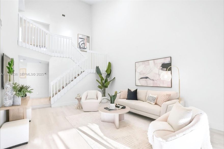 Turnkey 3BR/2.5BA end-unit in Boca Pointe with high ceilings, open living, and a modern kitchen with new Samsung appliances. Includes 2-car garage, screened patio, and serene primary suite. HOA covers water, cable, landscaping, roof, exterior insurance/paint, pool, and 24/7 security. Optional golf/tennis/clubhouse.