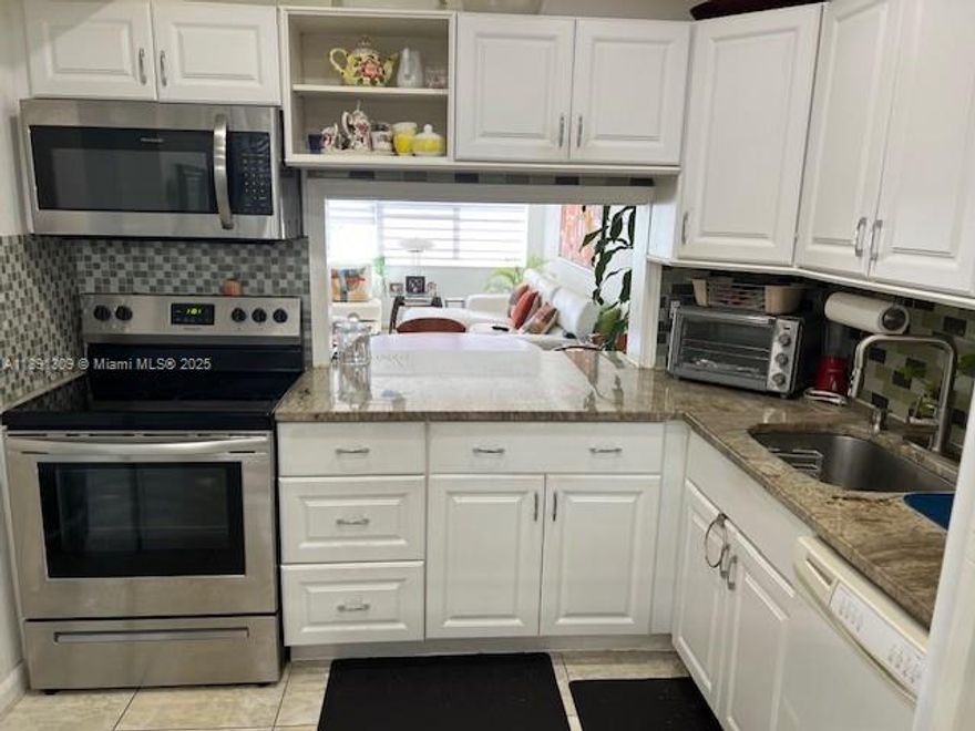 Bright all completely renovated unit with new kitchen cabinets granite countertops w/tile backsplash dishwasher stove with microwave and refrigerator all upgraded large living room large bedroom master bath w/ large walk in all tile shower new vanity and sink w/quartz top also half bath w/ newer vanity and sink w/ quartz top nice balcony +unit has impact windows and upgraded doors throughout AC unit 2+yrs young  also tankless water heater extra storage space and 40 and 50 year certification completed cable and water included in Maintenace 1 mile to beach close to shopping and transportation beautiful unit