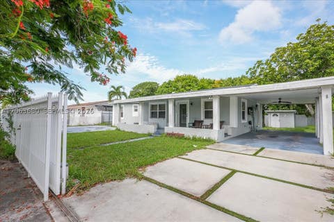 Photo of 20340 NW 42nd Ave, Miami Gardens, FL 33055 (MLS # A12063680)