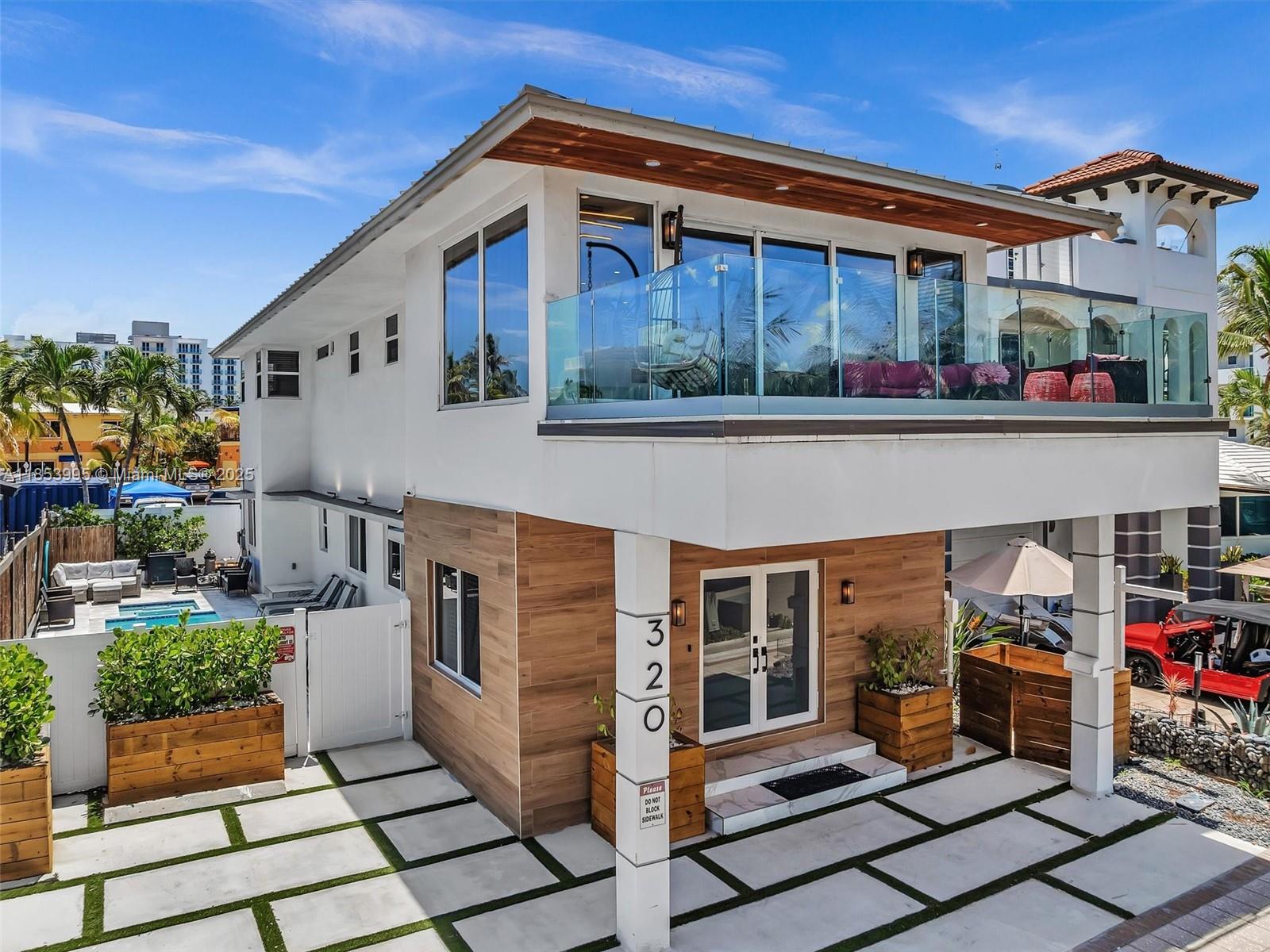 Steps from the sand, this stunning 2-story, 5-bedroom, 4-bathroom beach home offers the ultimate South Florida lifestyle. Fully renovated with modern finishes, it features a private swimming pool, parking, and an unbeatable location right on Hollywood Beach. Perfect for full-time living or a high-income Airbnb investment, this rare find combines oceanfront charm with luxury comfort. Enjoy ocean views, beach access just outside your door, and the best location on the coast. New roof. Priced to sell at only $2,500,000. This opportunity will not last