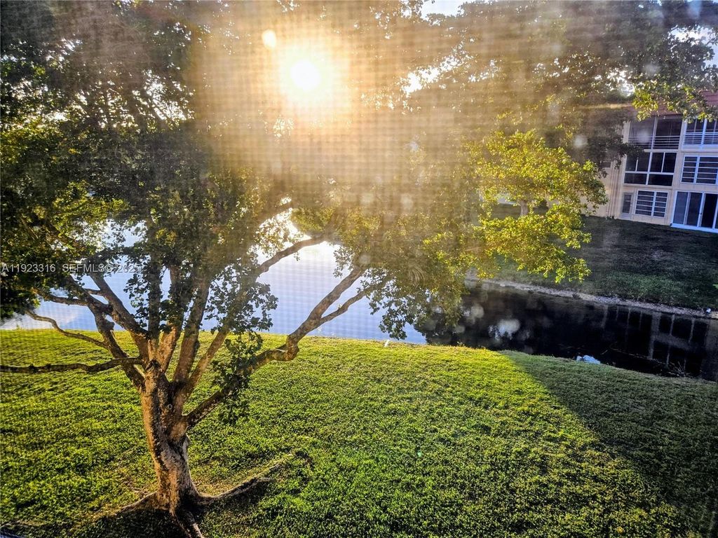 Photo of 2701 N Pine Island Rd #303, Sunrise, FL 33322 (MLS # A11923316)