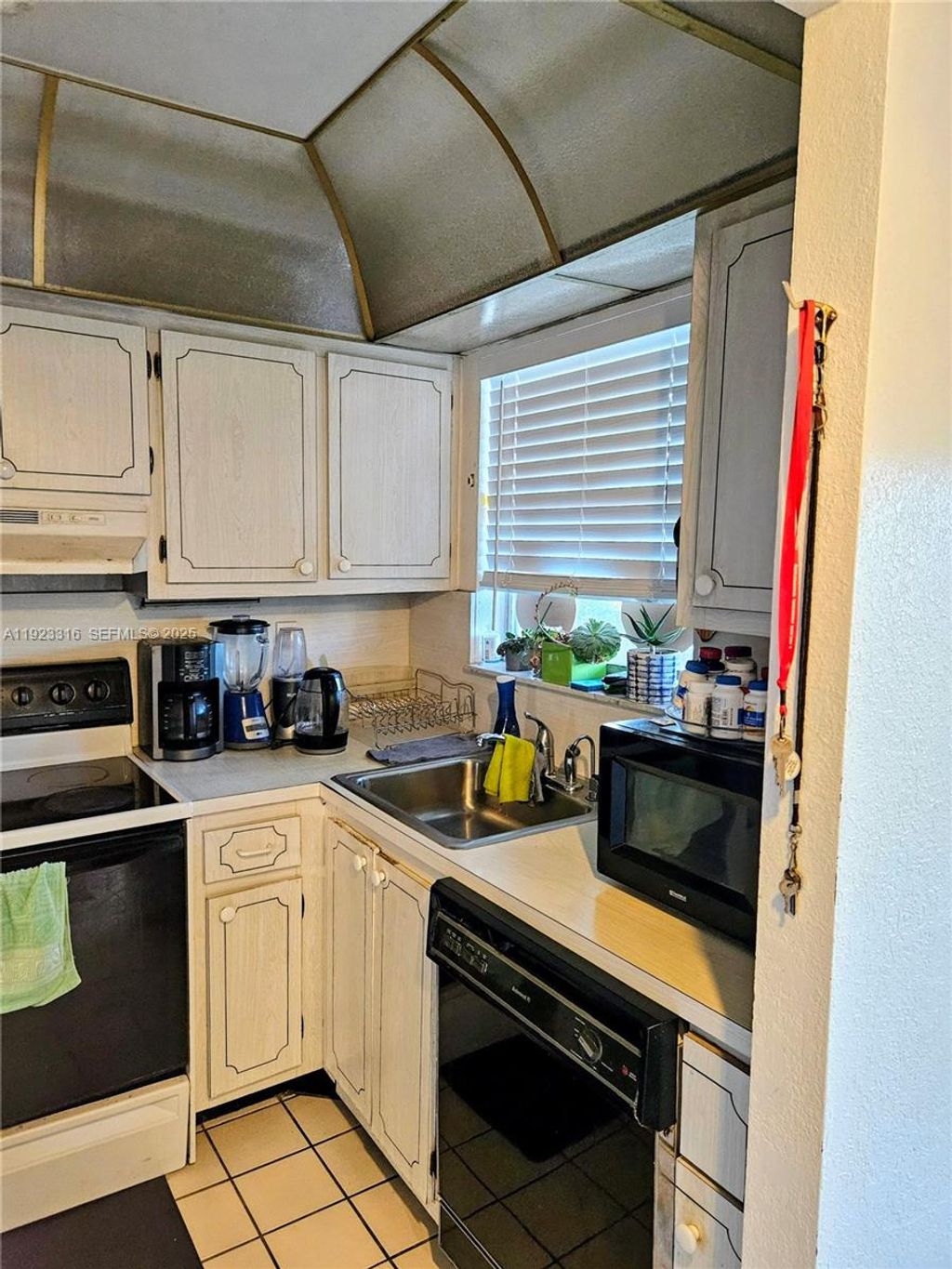 Photo of 2701 N Pine Island Rd #303, Sunrise, FL 33322 (MLS # A11923316)