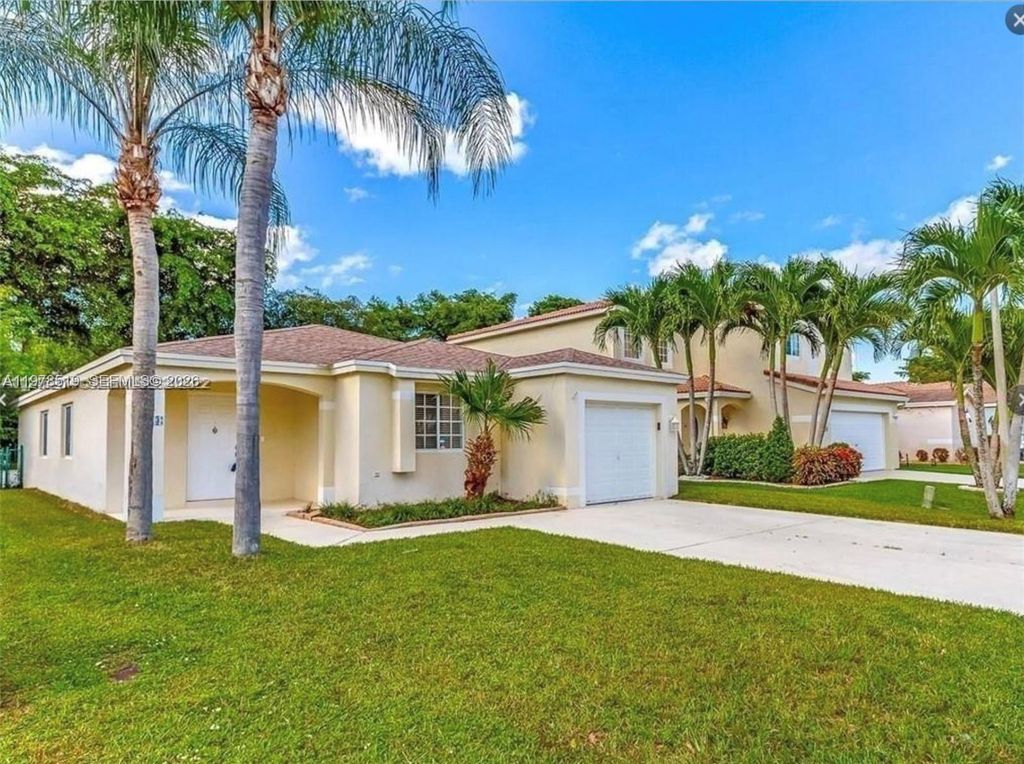 Photo of 1213 SW 46th Way, Deerfield Beach, FL 33442 (MLS # A11978519)