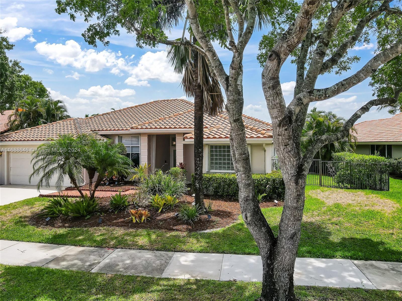 This exquisite home offers an exceptional blend of luxury and comfort. As you enter, you’re immediately greeted by stunning views of the pool and lake beyond, framed by floor-to-ceiling impact sliding windows that rush the home with natural light. The open floor plan, featuring vaulted ceilings, crown molding, and gleaming marble floors, creates a sense of elegance throughout. The master bedroom is a private retreat, with direct access to the pool, dual walk-in closets, and a spa-like bath complete with a double vanity, separate tub, and a glass-enclosed shower. Two additional spacious bedrooms share a stylish cabana bath, ideal for family and guests.
KITHCEN IS BEING FULLY REMODELED! MUST SEE!