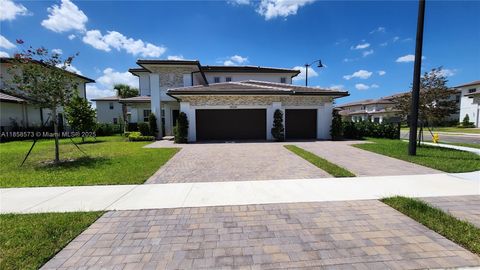 Photo of 12336 SW 43rd Ct, Davie, FL 33330 (MLS # A11858573)