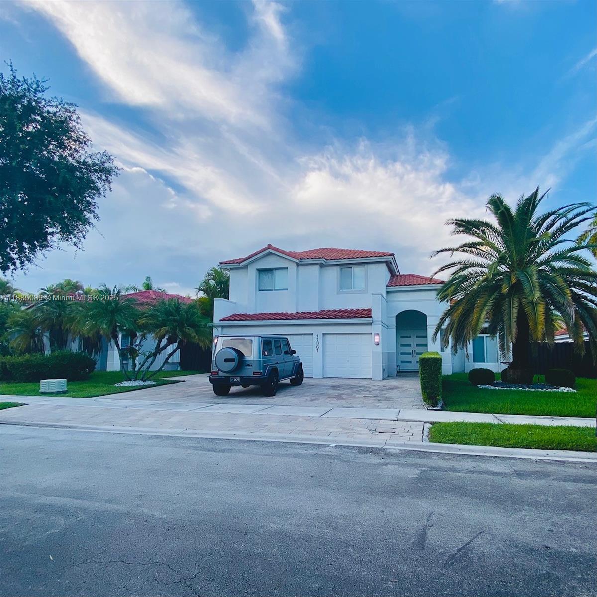 Welcome to your delightful new home in the spectacular Doral Isles. 4BR/3BA- Distinctive split-level layout offers sophisticated open living and private areas. First floor features marble flooring, bedroom and full bath; stairs and second level in high-end laminate. Open kitchen with quartz counters, T-design dining, stainless steel appliances. Impact windows, accordion shutters, 3-car garage with option for 5th bedroom. Patio with oversized pool and green areas for games and gatherings, plus counter space with sink. Resort-style Doral Isles offers 3 pools, gym, tennis, basketball, baseball, football, lakeside beaches, 24-hour security, and renowned Kraft restaurant for the best-happy hour in town! Growing, awesome Doral is centrally located, near A+ schools, shopping, highways and MIA.