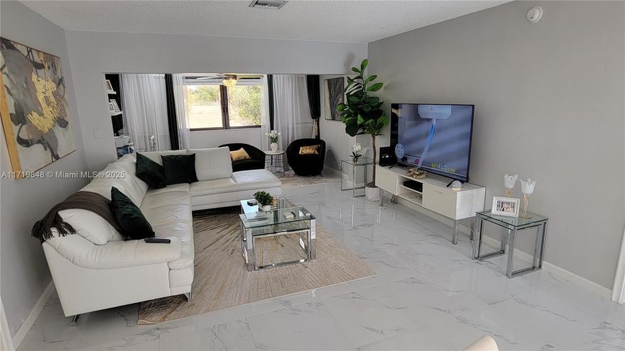 Gorgeous 2/2 apartment, tastefully renovated and centrally located in a gated community, minutes away from Clematis St., Elizabeth Square and Downtown West Palm. Accordion shutters and Impact-rated doors. A/C Replaced in 2021 and Roof in 2017. Association fees include Water, Cable TV and Internet. Won't Last!!