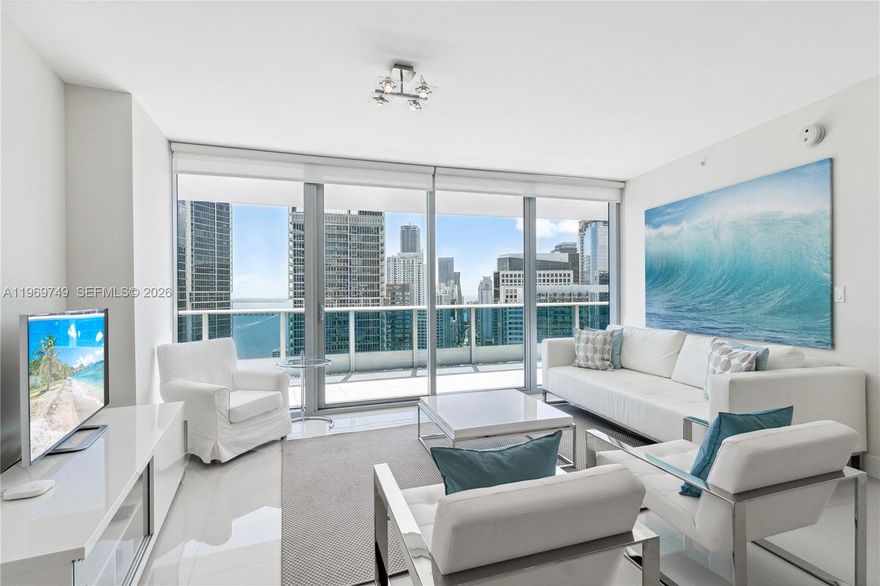 Nestled in Downtown Miami's Central Business District, Epic hotel condominium offers luxury living at its finest. Each room boasts access to the terrace, flooding the space with natural light and offering stunning views of downtown Brickell, Biscayne Bay, and the Atlantic Ocean. The hotel ensures top-notch service, while the Gym + Spa, overseen by Privai, provides exclusive wellness amenities. Complete with one assigned parking space, this fully furnished residence is ready for immediate occupancy, promising a lifestyle of luxury and convenience in the heart of Miami's vibrant landscape.