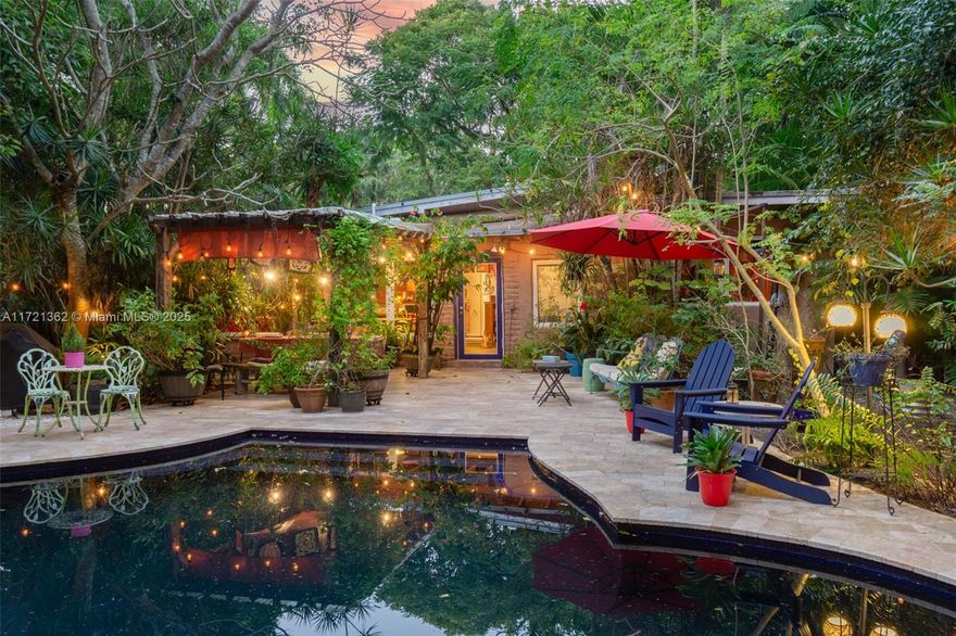 Enchanting describes this one-of-a-kind paradise on the quiet Snapper Creek Canal. Wander through paths of native flora, reflect at ponds, build a fire on the bank – living alfresco is extraordinary on this 32,300sf estate. Central to a haven one can only imagine lies a cool villa with views from every room and a wood burning fireplace, impact glass, and full-house generator to stay comfortable year-round. The most picturesque lagoon-style pool & dining terrace are dreamy backdrops for a garden party, and there’s even a hidden artist’s studio on the grounds! This is an exceptional offering; seemingly so remote one will forget the urban location, cool locales, and best schools & parks only moments away. Love this property like it is, expand it, or start new – the possibilities are endless.