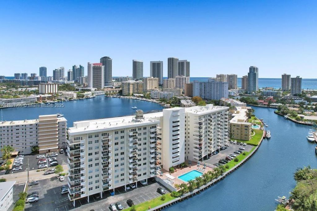 Photo of 401 Golden Isles Dr #705, Hallandale Beach, FL 33009 (MLS # A11801906)