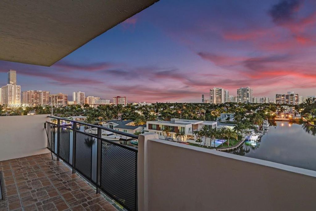 Photo of 401 Golden Isles Dr #705, Hallandale Beach, FL 33009 (MLS # A11801906)