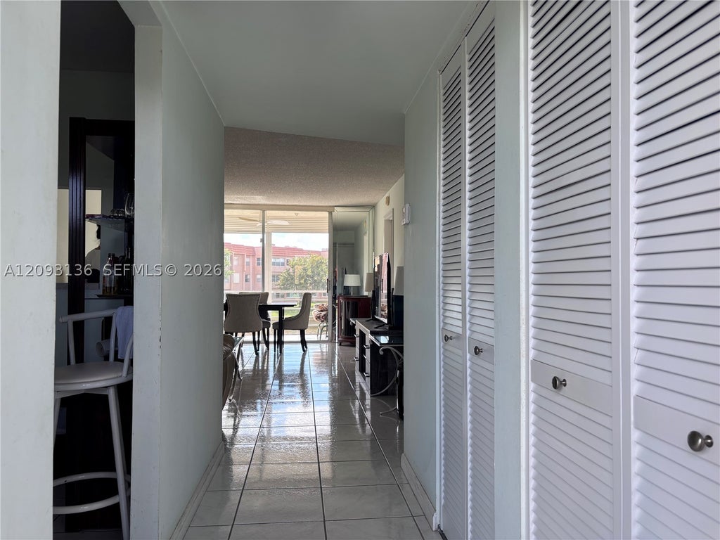 Photo of 9900 Sunrise Lakes Blvd #210, Sunrise, FL 33322 (MLS # A12093136)