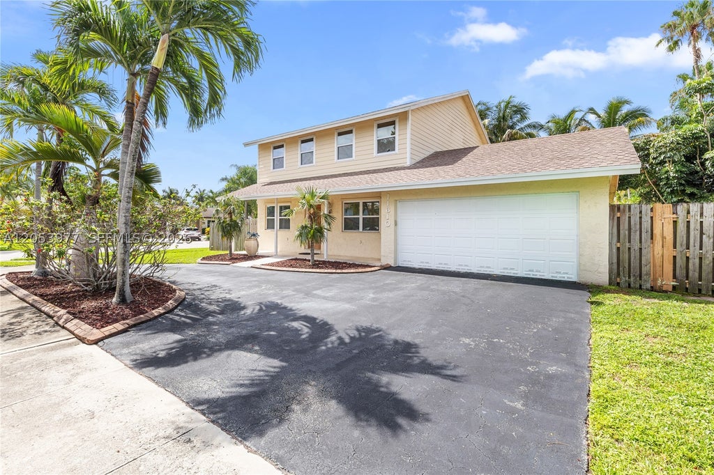 Photo of 11610 NW 43rd St, Sunrise, FL 33323 (MLS # A12053977)