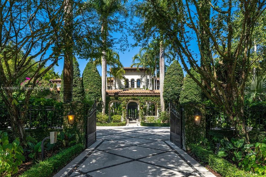 Uncover this enchanting tropical paradise in N Pinecrest, surrounded by lush exotic greenery. This stunning courtyard home greets you with water features, a grand foyer with a dramatic staircase, & soaring volume ceiling. The elegant floorplan boasts a gourmet kitchen equipped with Wolf/SubZero appliances, a breakfast area, and a family rm with serene outdoor views. Additional fts. include a spacious formal living rm, a wine rm, a home office, & a gym. The ground floor hosts a junior suite, while the primary suite upstairs offers a sitting room & spa bath. Experience the ultimate indoor/outdoor lifestyle w/ a resort-style pool & spa, expansive covered terraces, a built-in summer kitchen, & a lush botanical garden. This exquisite home also includes impact windows/doors, & a 3-car garage.