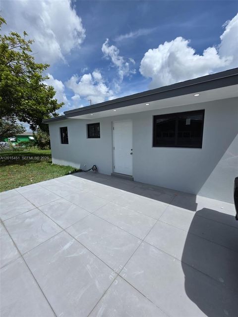 Photo of 20930 NW 30th Ct, Miami Gardens, FL 33056 (MLS # A12015451)