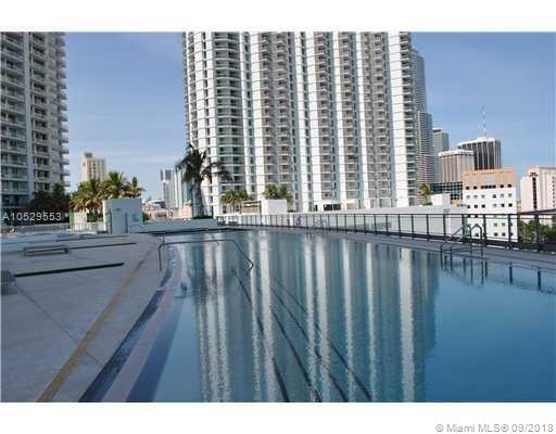 This stunning open and bright corner unit at MINT is located in the best line of the building.
Enjoy breathtaking panoramic Miami River and skyline views from this spacious 2 bedrooms + Den and 2 1/2 bathrooms. Large wraparound balcony with floor-to-ceiling glass. This unit features porcelain floors throughout, modern european kitchen w/ top of the line SS appliances, gorgeous master suite w/ built in closets, Washer and Drier in unit. Outstanding building amenities, Pool, SPA, Gym, business center, children playground, 24 hour concierge and valet. Walking distance from New Brickell city center, Downtown and Brickell area.