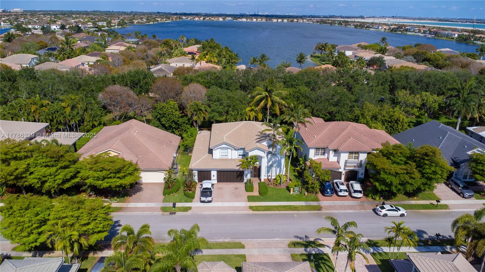YOU ARE INVITED TO SEE THIS SPACIOUS, BEAUTIFUL HOME WITH 5 BEDROOMS AND 3 FULL BATHROOMS AND AMAZING POOL. One Bedroom with Full Bathroom down stairs. Extra Room in Master Bedroom for an Office or New Born Room. Enjoy the Peace and Privacy of desirable Sunset Falls Gated Community, Tennis Court, Gym, Basketball Court, Pool, Park with a Beautiful Lake view.