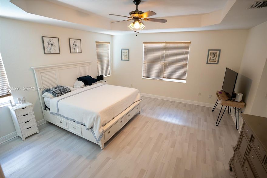 Move-in-ready 5-bedroom, 3-bath home in the desirable Sunset Falls gated community in Miramar. Features include oversized living areas, a full bedroom and bath downstairs, and a spacious primary suite with an extra room ideal for an office or nursery. Enjoy a private backyard with a beautiful pool, perfect for entertaining. Sunset Falls offers resort-style amenities including a pool, gym, tennis and basketball courts, park, and scenic lake views. Seller motivated—don’t miss this opportunity for space, privacy, and lifestyle living.