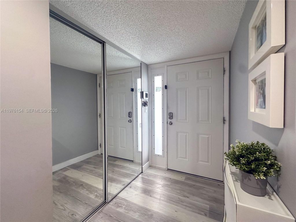 Photo of 2766 S Carambola Cir S #404, Coconut Creek, FL 33066 (MLS # A11976154)