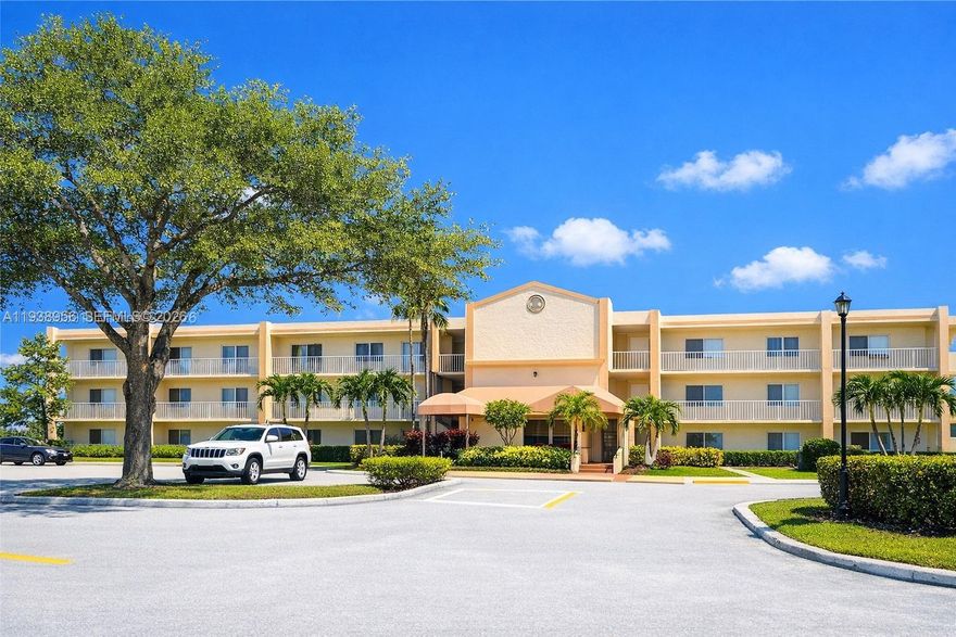 Exceptional value! Certifications up to date on this beautiful 2/2 waterfront condo located on the 1st floor in desirable Devon community at Kings Point, a vibrant 55+ active neighborhood. You will find a clean, bright, airy & freshly painted home featuring TILE FLOORS THROUGHOUT. The spacious SCREENED PATIO WITH ROLL-DOWN SHUTTERS PROVIDES A PEACEFUL WATERVIEW as you sip your morning coffee or relax in the evening. Split bedroom floor plan offers privacy, the primary featuring ensuite bath & large walk-in closet. The well-appointed kitchen has ample cupboards & an EXTENDED BREAKFAST AREA with front-facing window for natural light, &  snack counter with PASS-THRU WINDOW TO DINING AREA for easy entertaining. Home is enhanced with HURRICANE IMPACT WINDOWS for added security & peace of mind. The sought-after LAUNDRY ROOM INSIDE HAS FULL WASHER & DRYER & EXTRA STORAGE. Unit's assigned parking is directly in front for your convenience. Devon is ideally located near the Sawgrass Expressway & minutes to Sawgrass & Coral Square malls, restaurants, hospitals & more. An air-conditioned courtesy bus is available. Total HOA includes water, cable, internet, roof, building insurance, gate security, maintenance & trash removal. Residents enjoy access to the renowned 1000+ seat Kings Point Palace Theater, RESORT STYLE FACILITES, multiple meeting rooms, business center, gym, heated pools, many clubs & social activities that supports an active South Florida lifestyle. Schedule your appointment