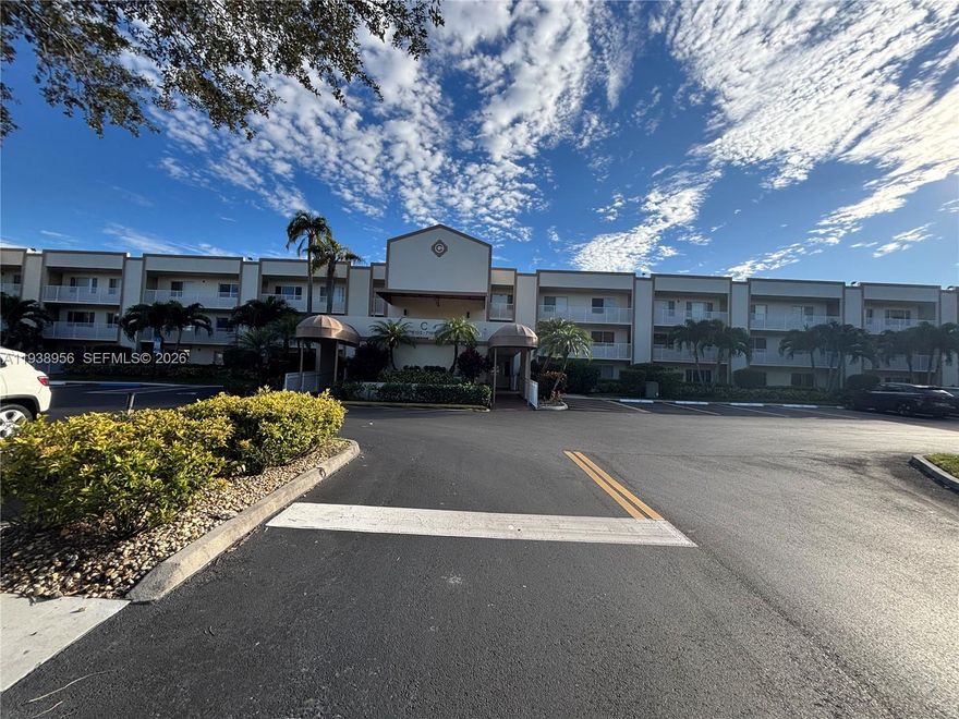 NEW LOWER PRICE!  Discover exceptional value in this beautiful 2/2 waterfront condo located on the 1st floor in desirable Devon at Kings Point, a vibrant 55+ active neighborhood. You will find a clean, bright, airy & freshly painted home featuring all tile flooring throughout. The spacious screened patio with roll-down shutters provides peaceful water views as you sip your morning coffee or relax in the evenings. Split bedroom floor plan offers privacy, the primary suite featuring ensuite bath & large walk-in closet. The well-appointed kitchen includes an extended breakfast area, a front-facing window for natural light & snack counter at large pass-thru window to the dining area for easy entertaining.  Home is enhanced with hurricane impact windows for added security & peace of mind. The sought-after laundry room inside the unit features full washer & dryer with extra storage. Unit's assigned parking is directly in front for your convenience.  Devon is ideally located near the Sawgrass Expressway & just minutes from Sawgrass & Coral Square malls, restaurants, hospitals & more. 
The HOA includes water, cable, internet, roof, building insurance, gate security, ext. maintenance & trash removal. An air-conditioned courtesy bus is available. Residents enjoy access to the renowned 1000+ seat Kings Point Palace Theater, resort-style facilities, multiple meeting rooms, business center, gym, heated pools, many clubs & social activities that supports an active South Florida lifestyle.