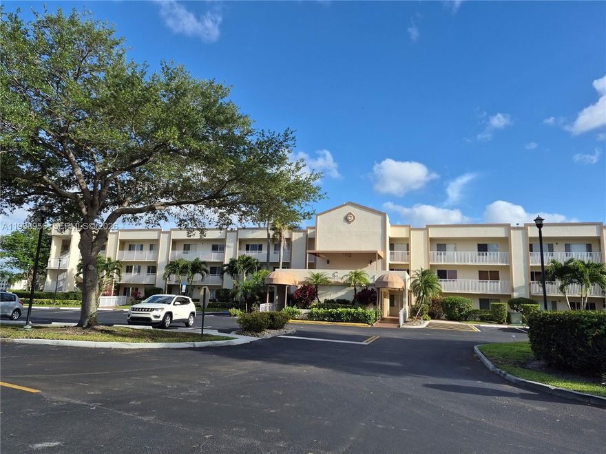 NEW LOWER PRICE!  Discover exceptional value in this beautiful 2/2 waterfront condo located on the 1st floor in desirable Devon at Kings Point, a vibrant 55+ active neighborhood. You will find a clean, bright, airy & freshly painted home featuring all tile flooring throughout. The spacious screened patio with roll-down shutters provides peaceful water views as you sip your morning coffee or relax in the evenings. Split bedroom floor plan offers privacy, the primary suite featuring ensuite bath & large walk-in closet. The well-appointed kitchen includes an extended breakfast area, a front-facing window for natural light & snack counter at large pass-thru window to the dining area for easy entertaining.  Home is enhanced with hurricane impact windows for added security & peace of mind. The sought-after laundry room inside the unit features full washer & dryer with extra storage. Unit's assigned parking is directly in front for your convenience.  Devon is ideally located near the Sawgrass Expressway & just minutes from Sawgrass & Coral Square malls, restaurants, hospitals & more. 
The HOA includes water, cable, internet, roof, building insurance, gate security, ext. maintenance & trash removal. An air-conditioned courtesy bus is available. Residents enjoy access to the renowned 1000+ seat Kings Point Palace Theater, resort-style facilities, multiple meeting rooms, business center, gym, heated pools, many clubs & social activities that supports an active South Florida lifestyle.